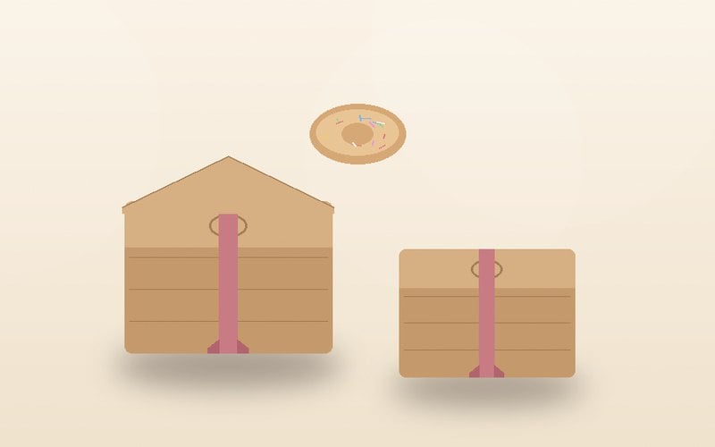 Kraft stamped donut boxes stacked at a farmers market stall
